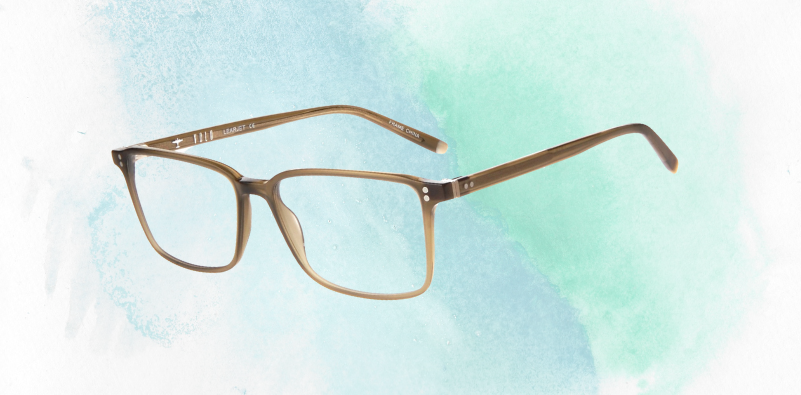 A pair of Volo Learjet eyeglasses on a blue gradient background