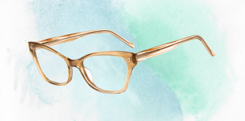 A pair of Success Brynn eyeglasses on a blue gradient background